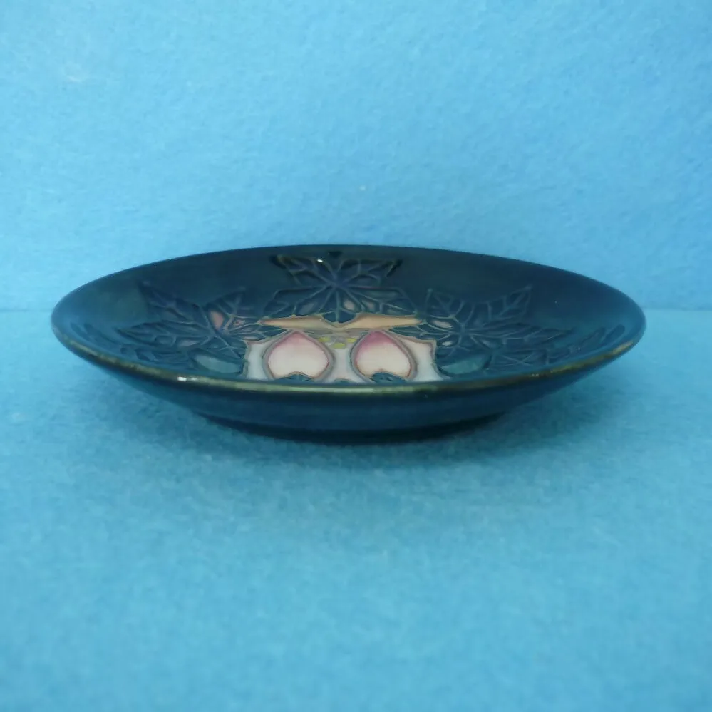 A Moorcroft Pin Dish in the Cluny Design © 1992 by Sally Tuffin.