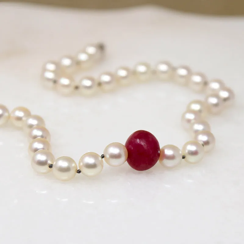 Creamy Pearls with Ruby Bead Accent by Ancient Influences