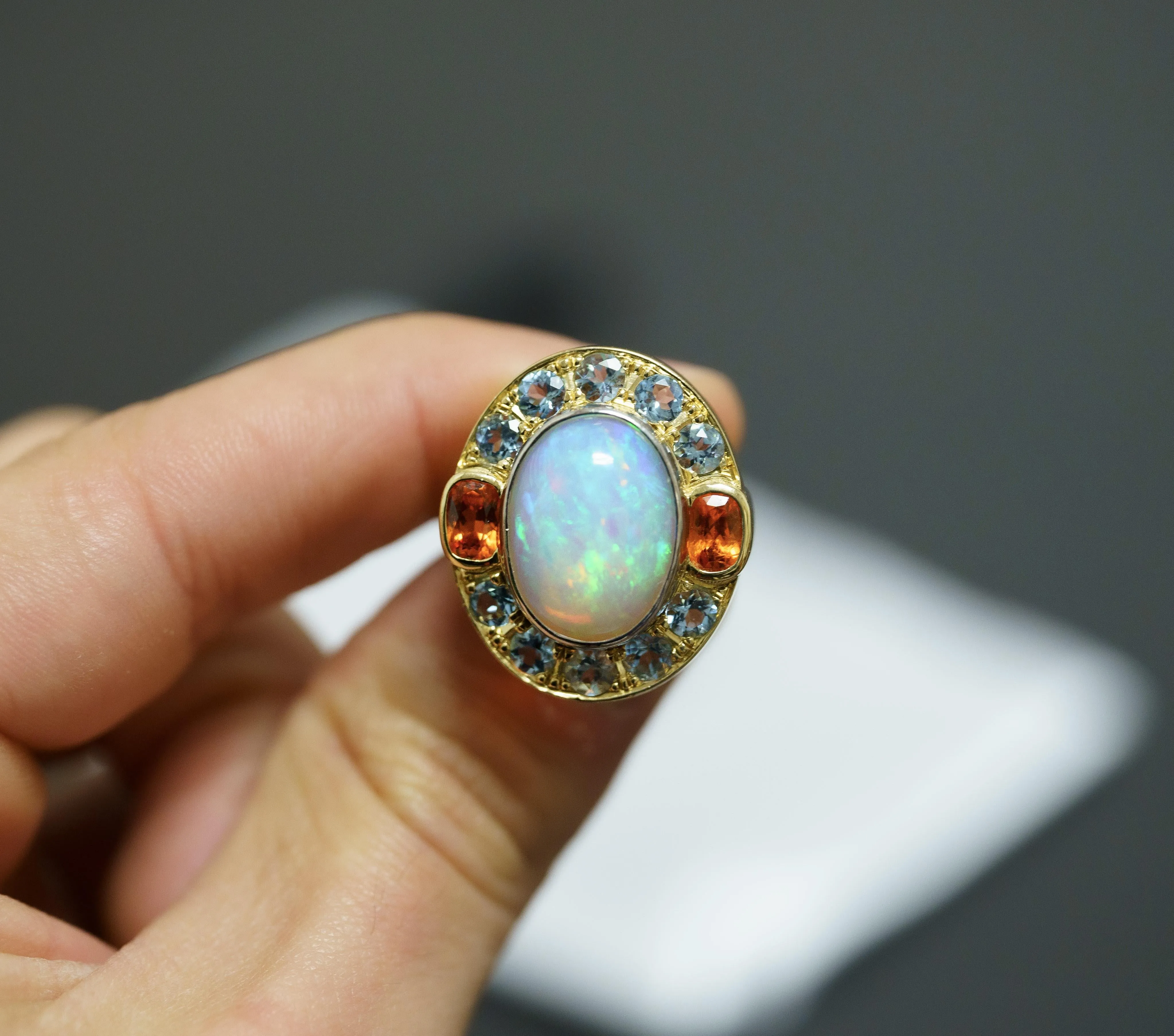 GIA Certified 8 Carat White Opal With Orange Garnet & Aquamarine Halo Ring